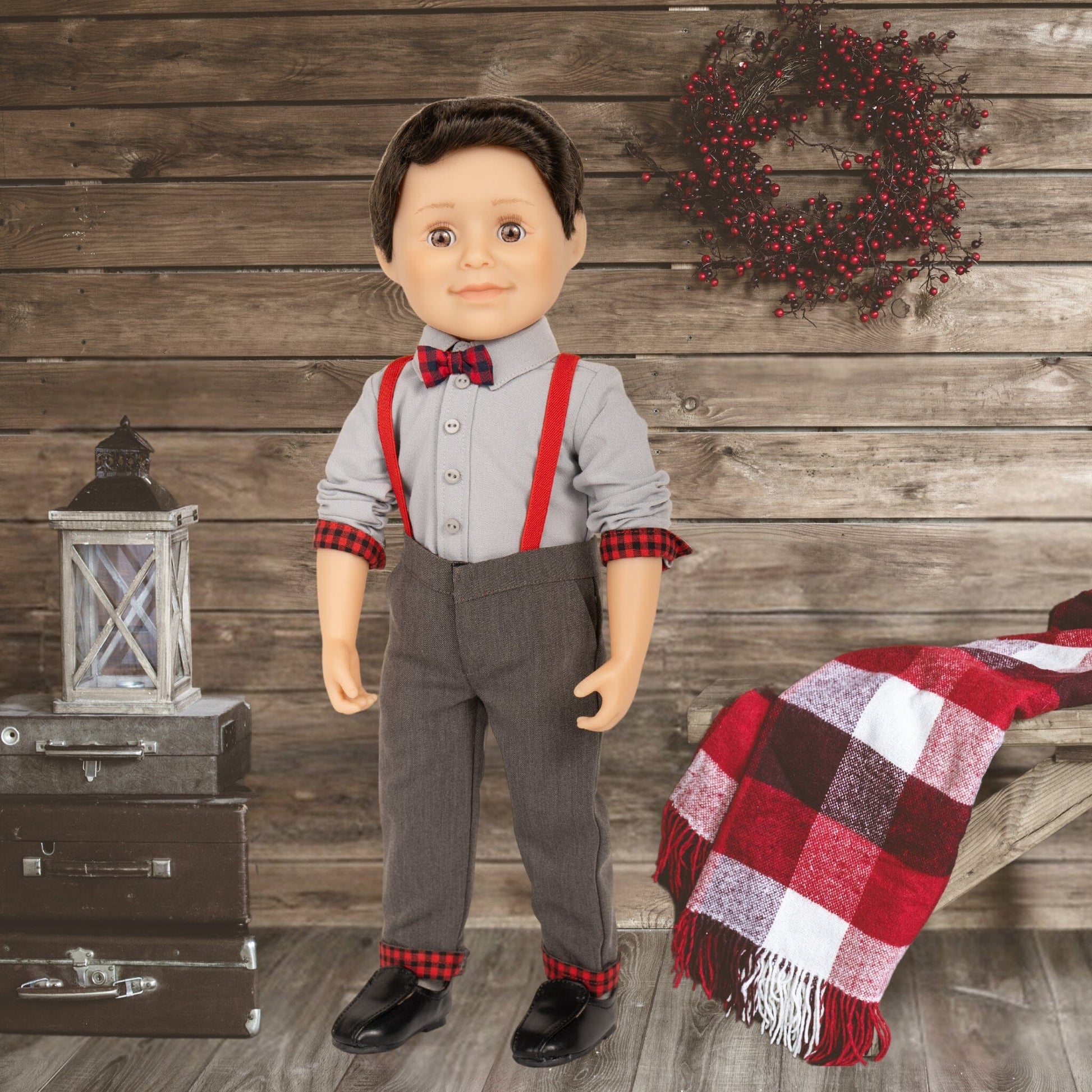 18-inch-boy-doll-wearing rural roots button up shirt and suspenders with plaid detailing.