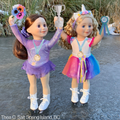 two 18-inch dolls holding trophies wearing their ice skating and magical unicorn outfits