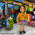 Alexi loves shopping at Kensington Market in Toronto on Pedestrian Sundays where she wears her Kensington loafers from Maplelea.