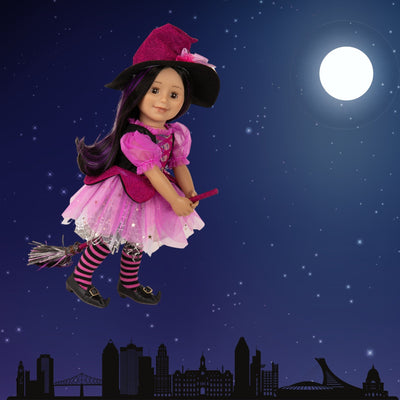 Doll in witch's outfit taking a broomstick ride on Halloween night. over a Montreal skyline.