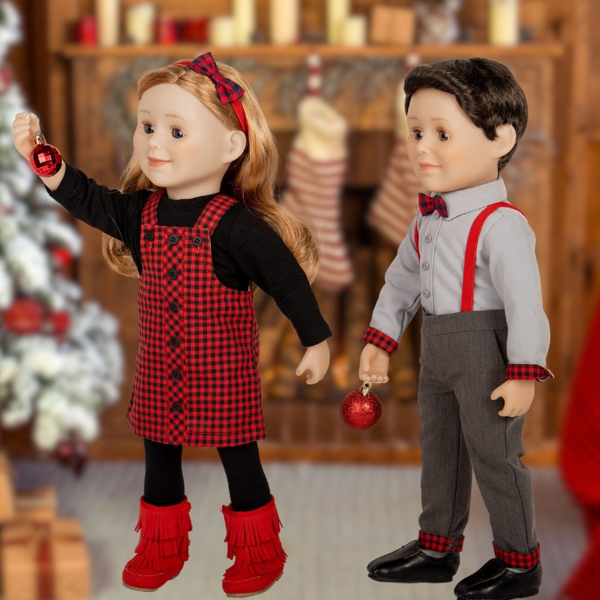girl doll and boy doll dressed in rural roots dress and suspender outfits.