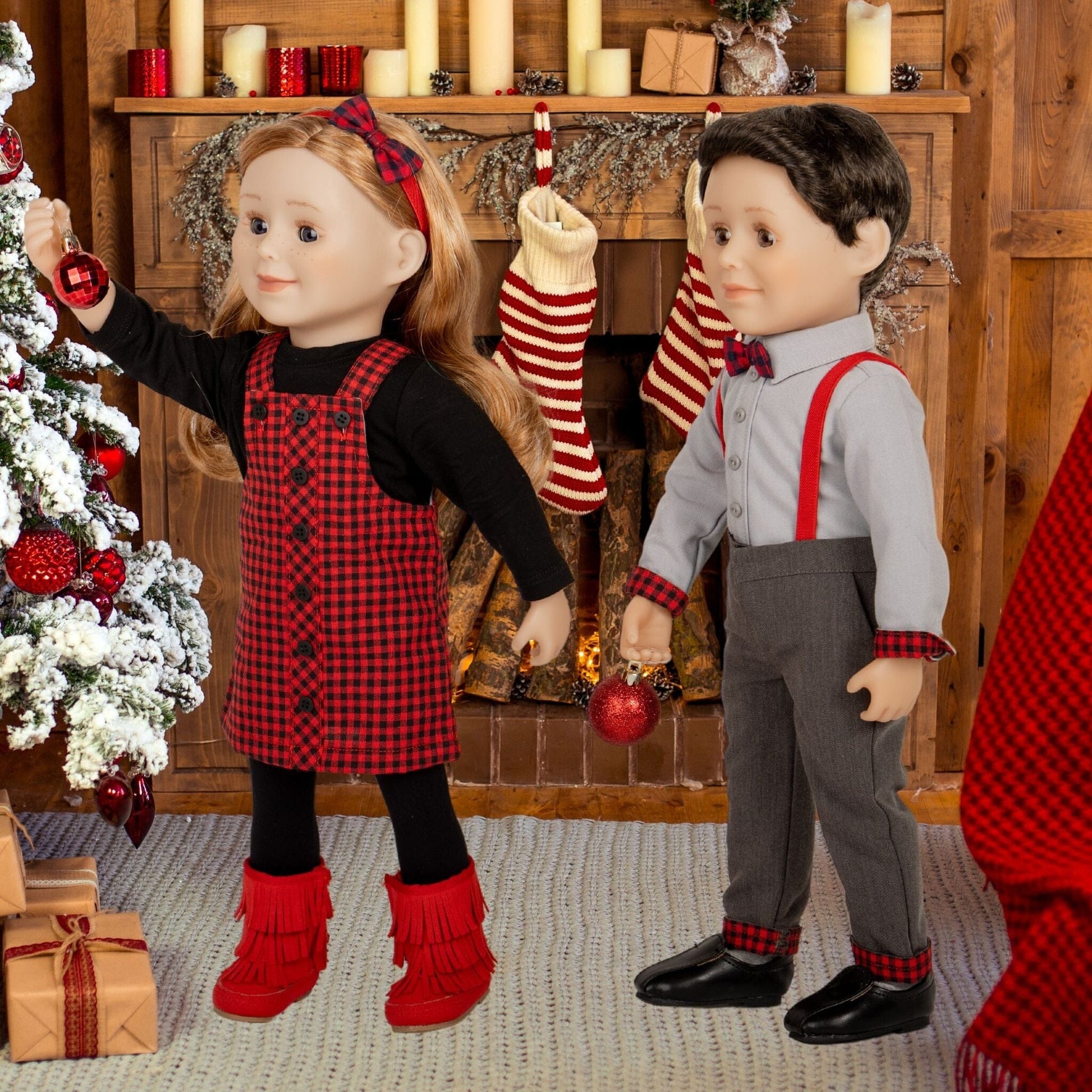 girl and boy doll wearing the rural roots dress and vest sets