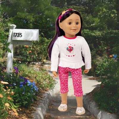 18" Maplelea doll picking up mail in heart-themed peblum top with legging for Valentine's Day