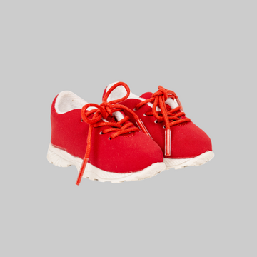 Red sneakers with white soles for 18-inch dolls.