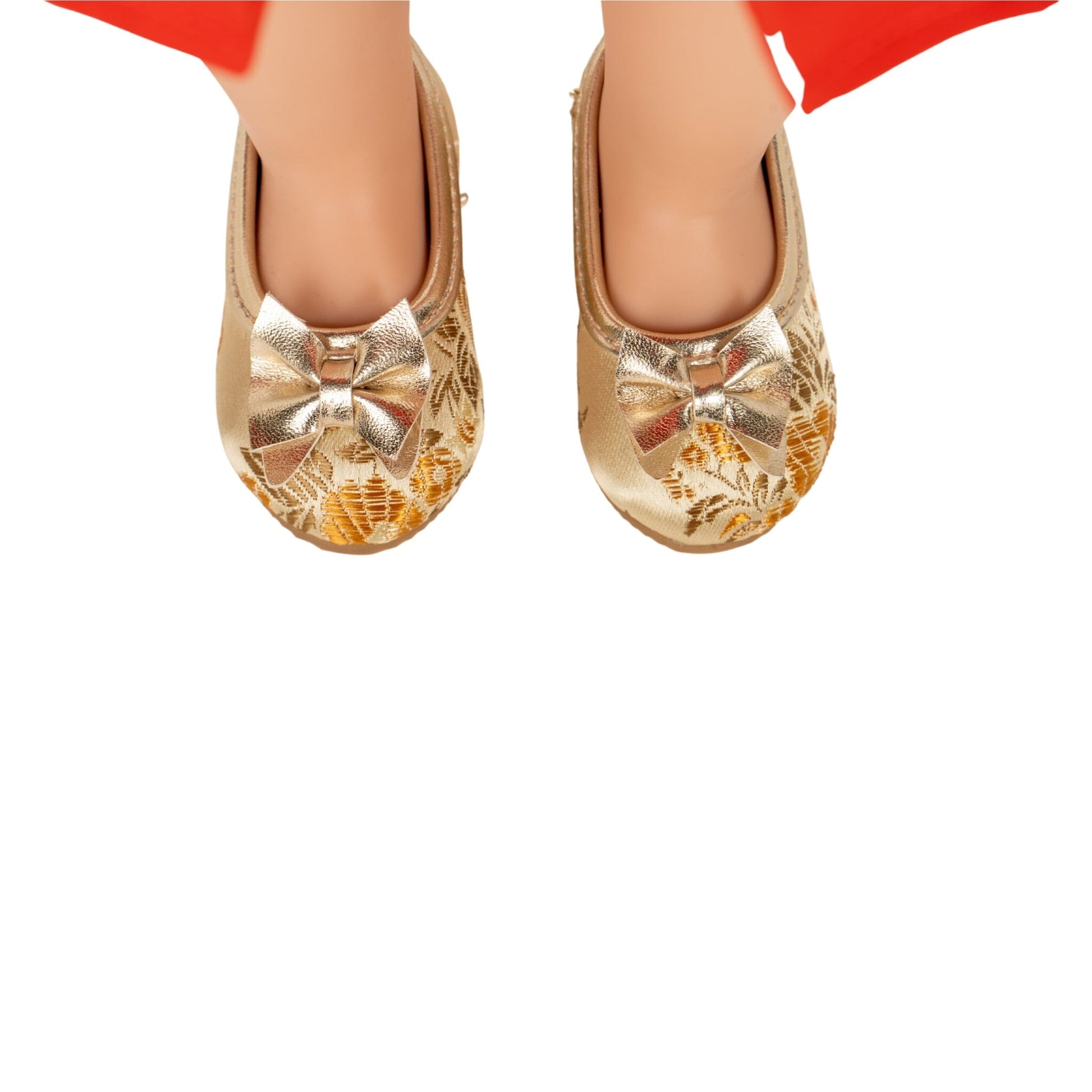 close up of gold brocade shoes
