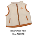 Beige sherpa vest with brown suede trim and real pockets for 18-inch dolls.