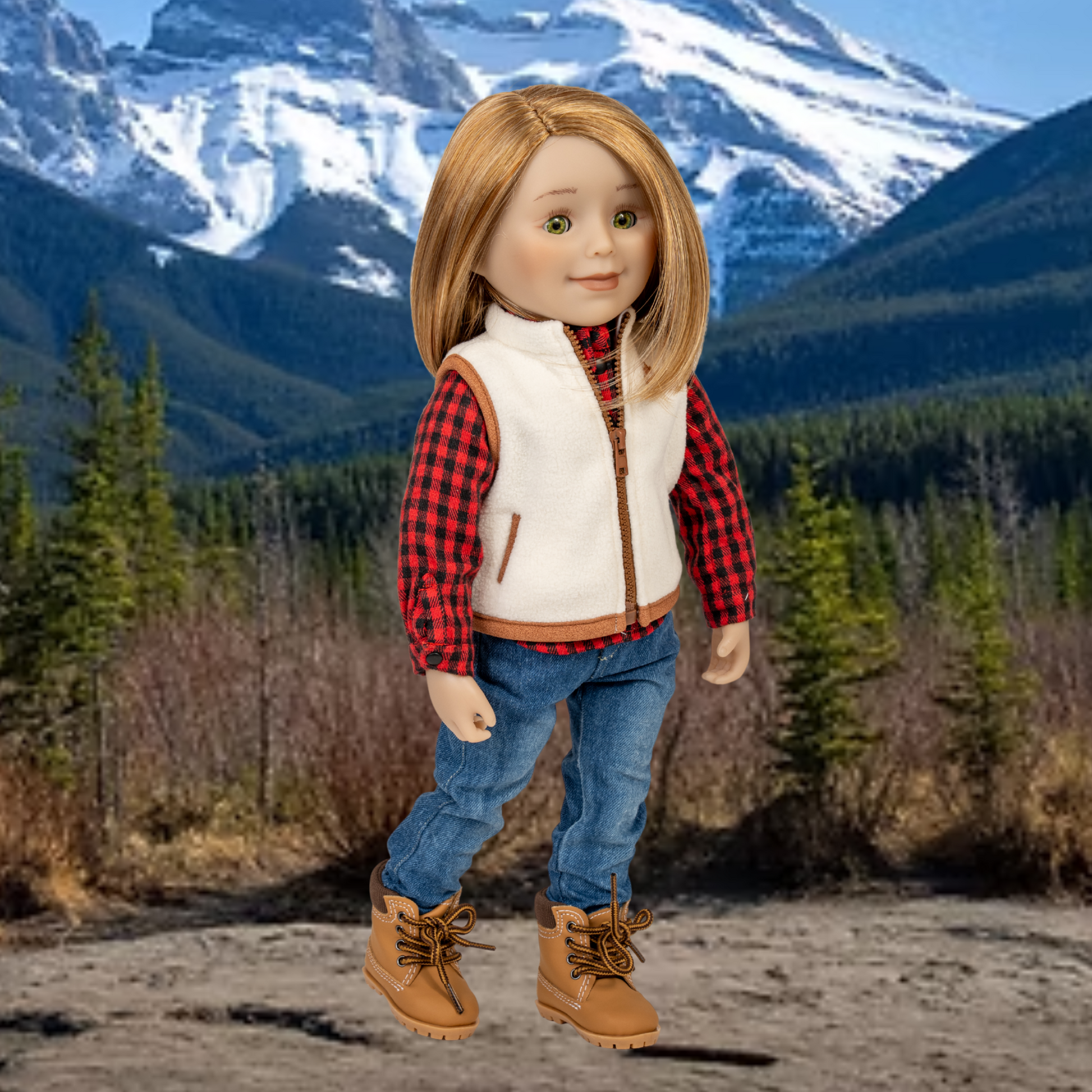 18-inch doll wearing sherpa vest button up and jeans in outdoor setting with mountains and trees.