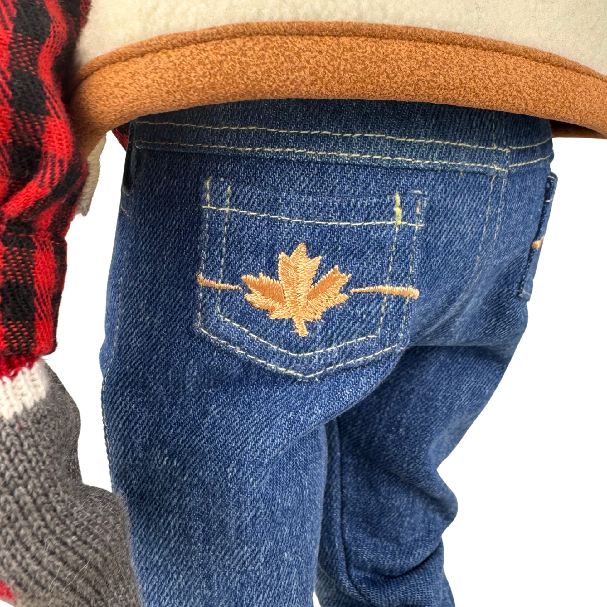 18-inch doll blue jeans with a maple leaf embroidered design on the pocket.