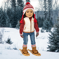 Pair of brown 18-inch doll boots with white fur lining on doll dressed for winter on snowy background in Canada.