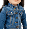 Close-up of a doll wearing a blue denim jacket with buttons.