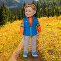 Canadian boy doll has short blonde hair, blue eyes, and comes in tee, track pants, vest and shoes.