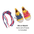Bright yellow high top runners for dolls are embroidered with colourful flowers and buzzing bee