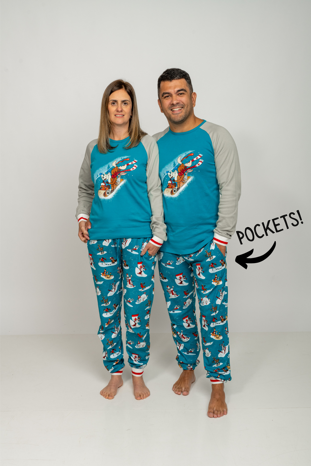 adults wearing slippery slope pjs