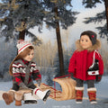 two dolls wearing winter outfits with skates and sled