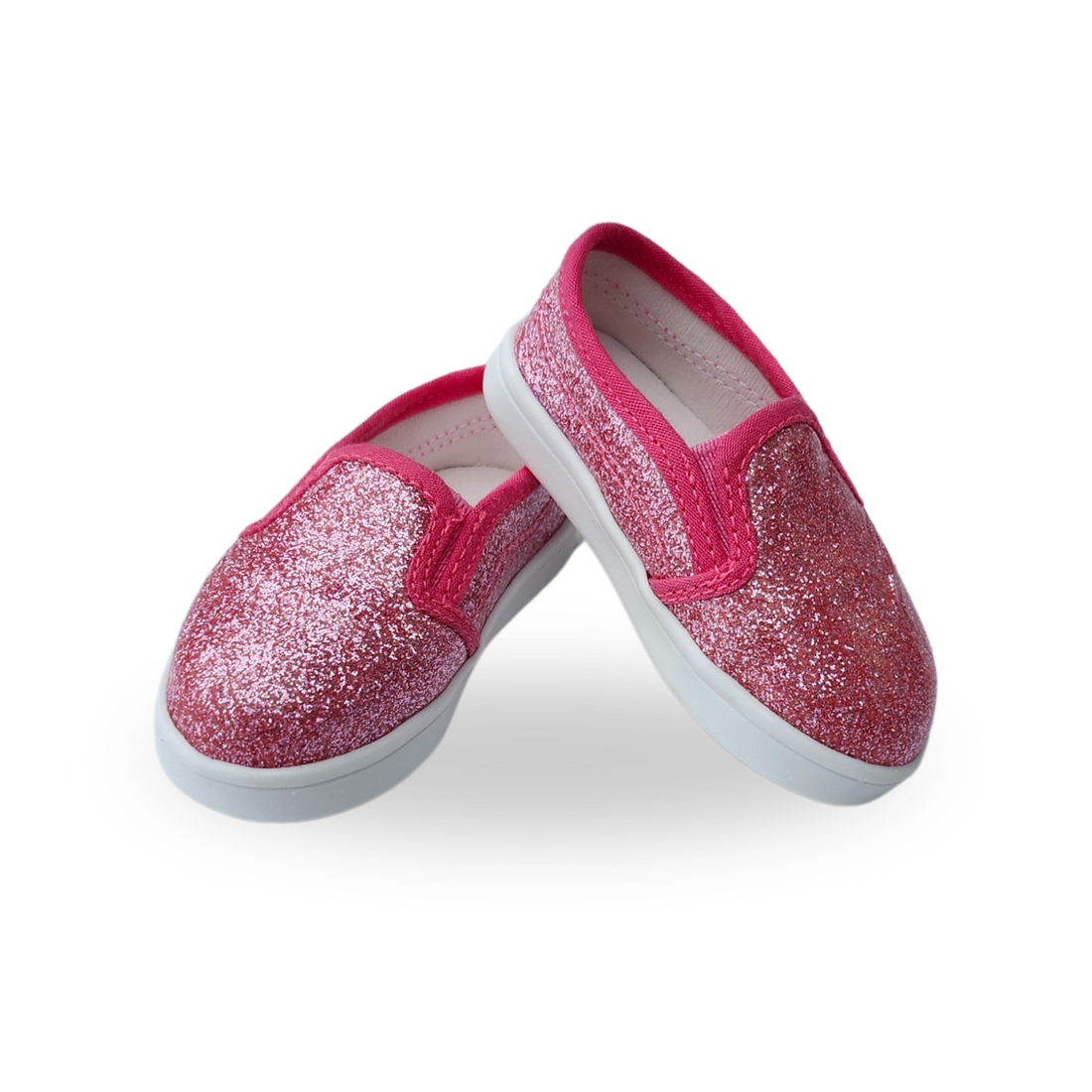 Front view of maplelea swan river slip-on doll shoes.