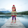 Canadian girl doll wearing a colourful ski sweater with matching tuque and socks