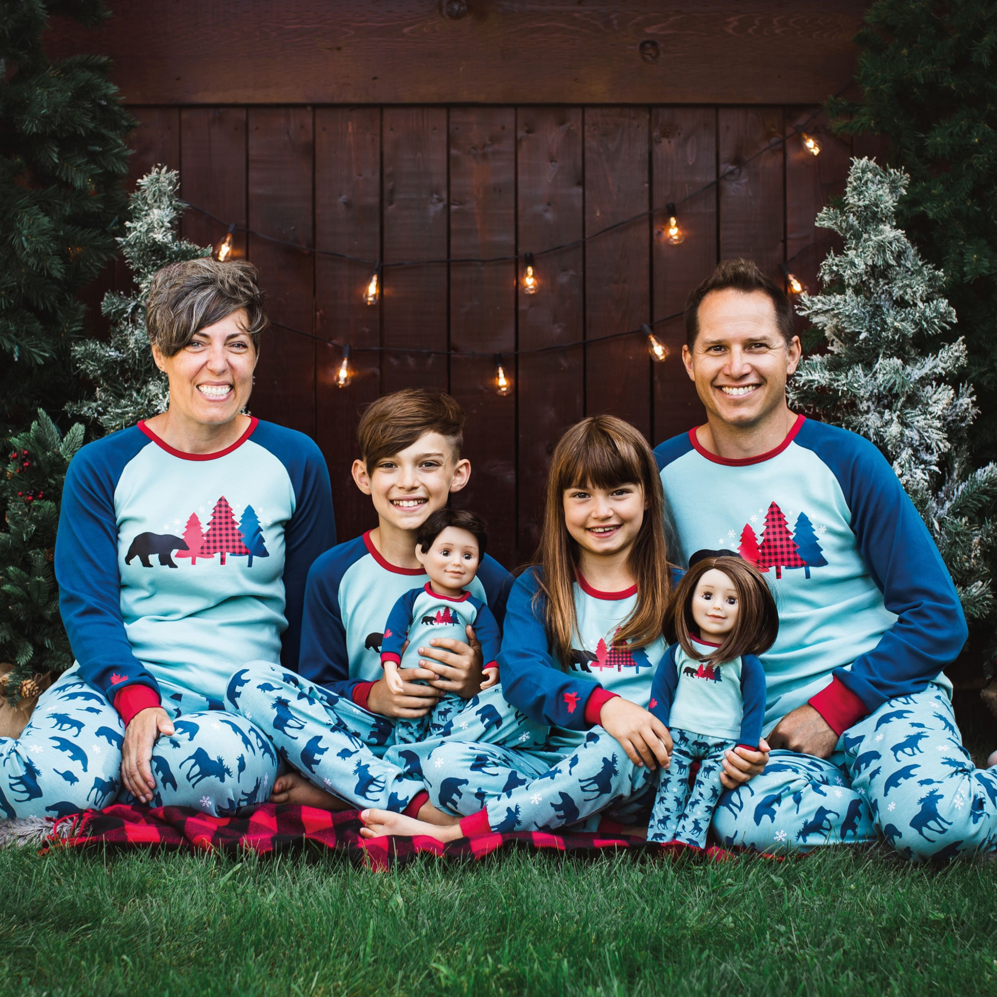 family wearing blue spruce pajamas