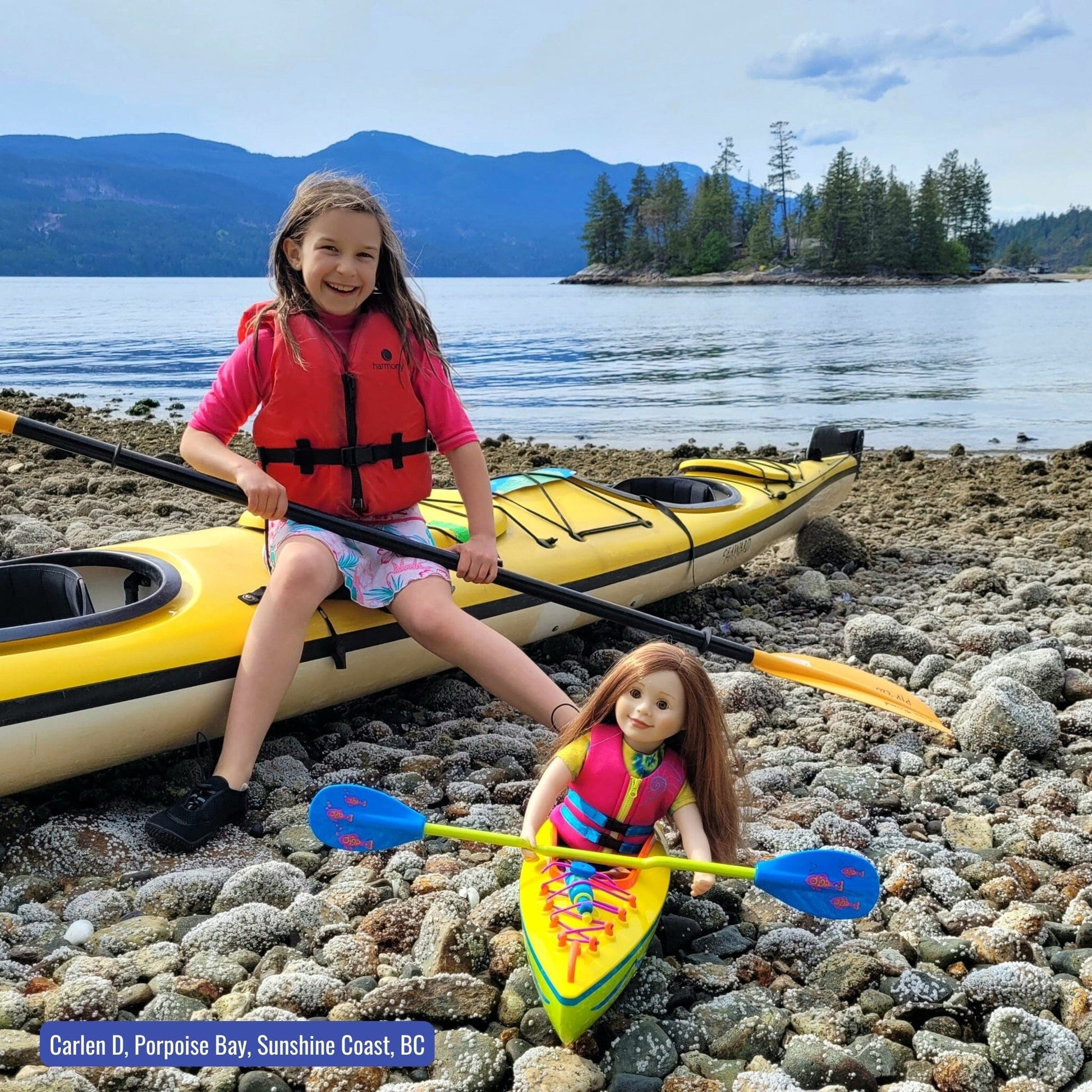 user generated content of girl and her girl doll both in kayaks