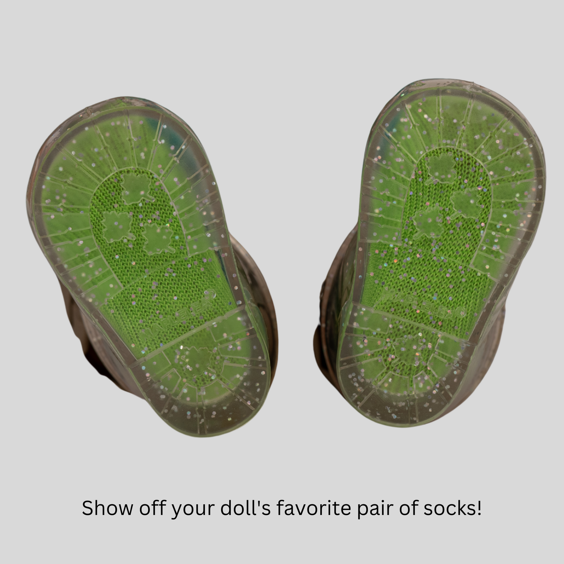 Clear sparkly rain boots fit all 18 inch dolls.