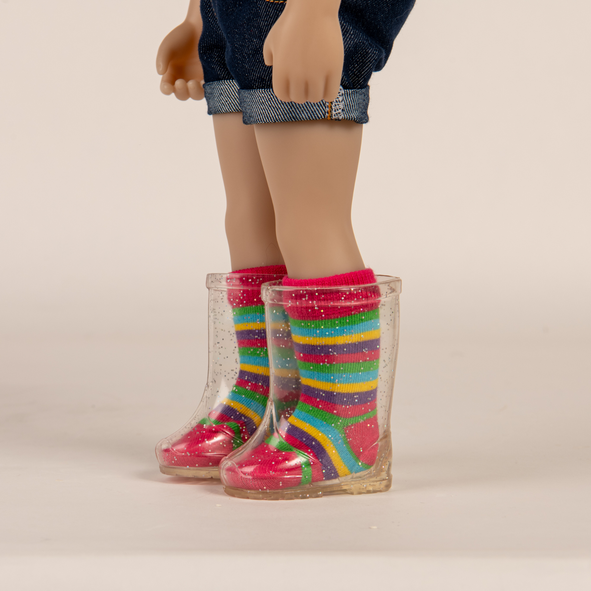 Clear sparkly rain boots fit all 18 inch dolls.