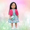 brown-haired doll wearing spring dress with bunny shoes and bunny purse