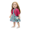 doll wearing a cute Easter dress, bunny shoes and purse