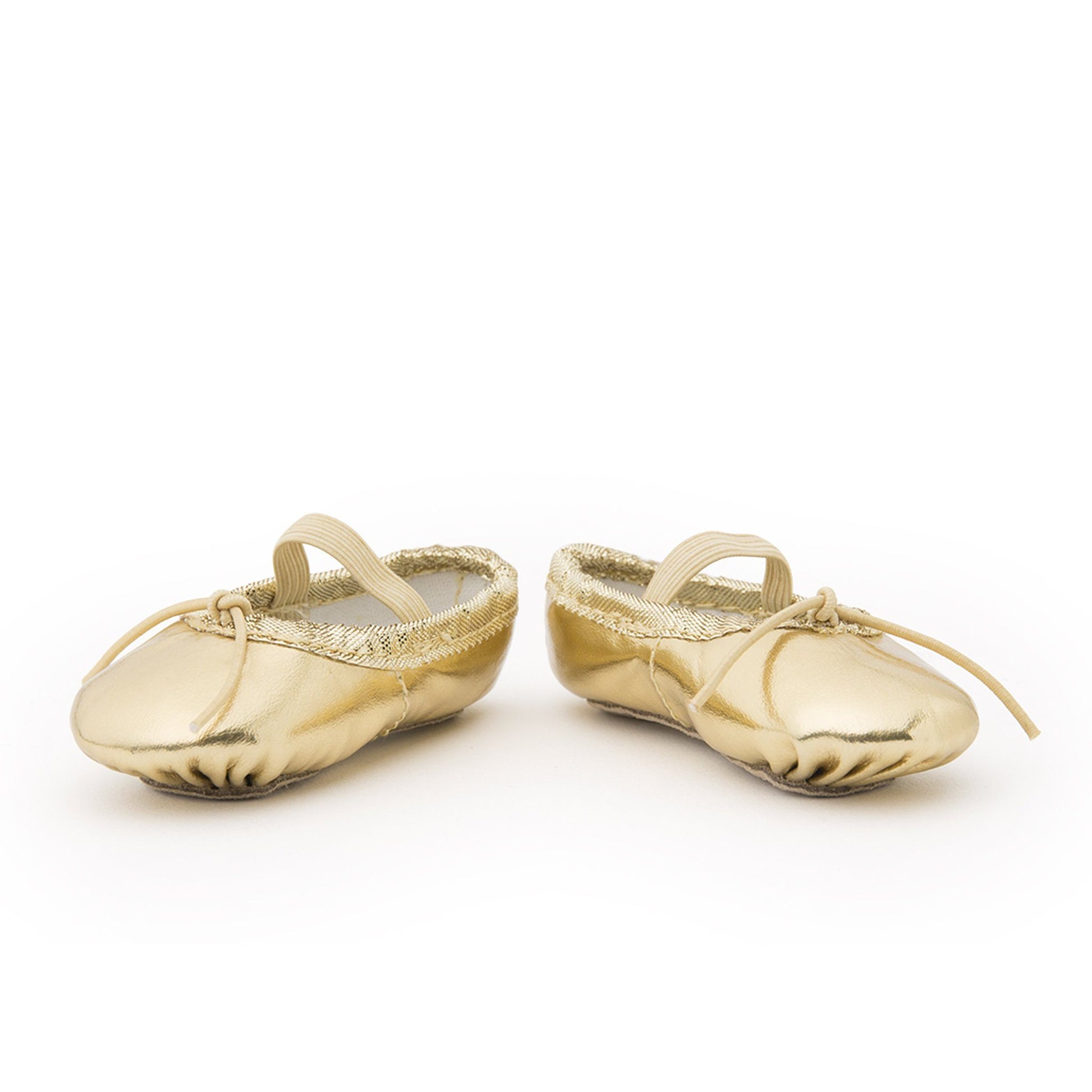 flat image of gold ballet slippers