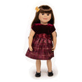 18-inch doll wearing plaid dress for festive occasion