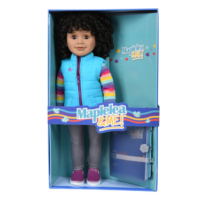 doll with curly black hair in doll box