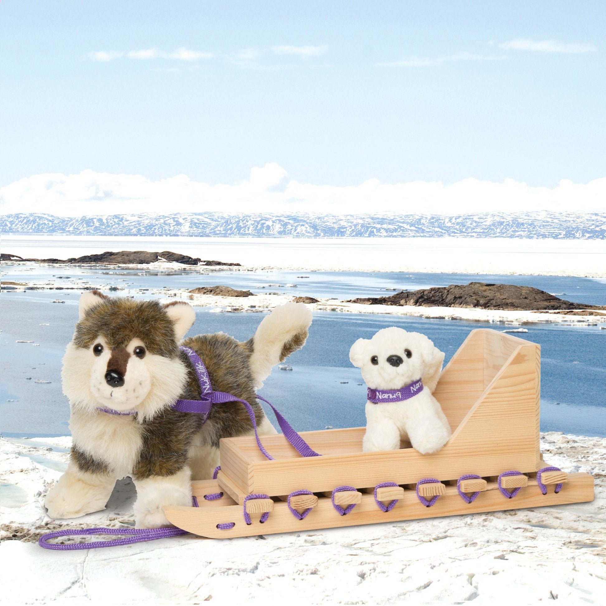 Inuit sled for 18-inch dolls shown with plush Inuit dogs.
