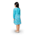Girl wearing a comfy dress shown from the back.
