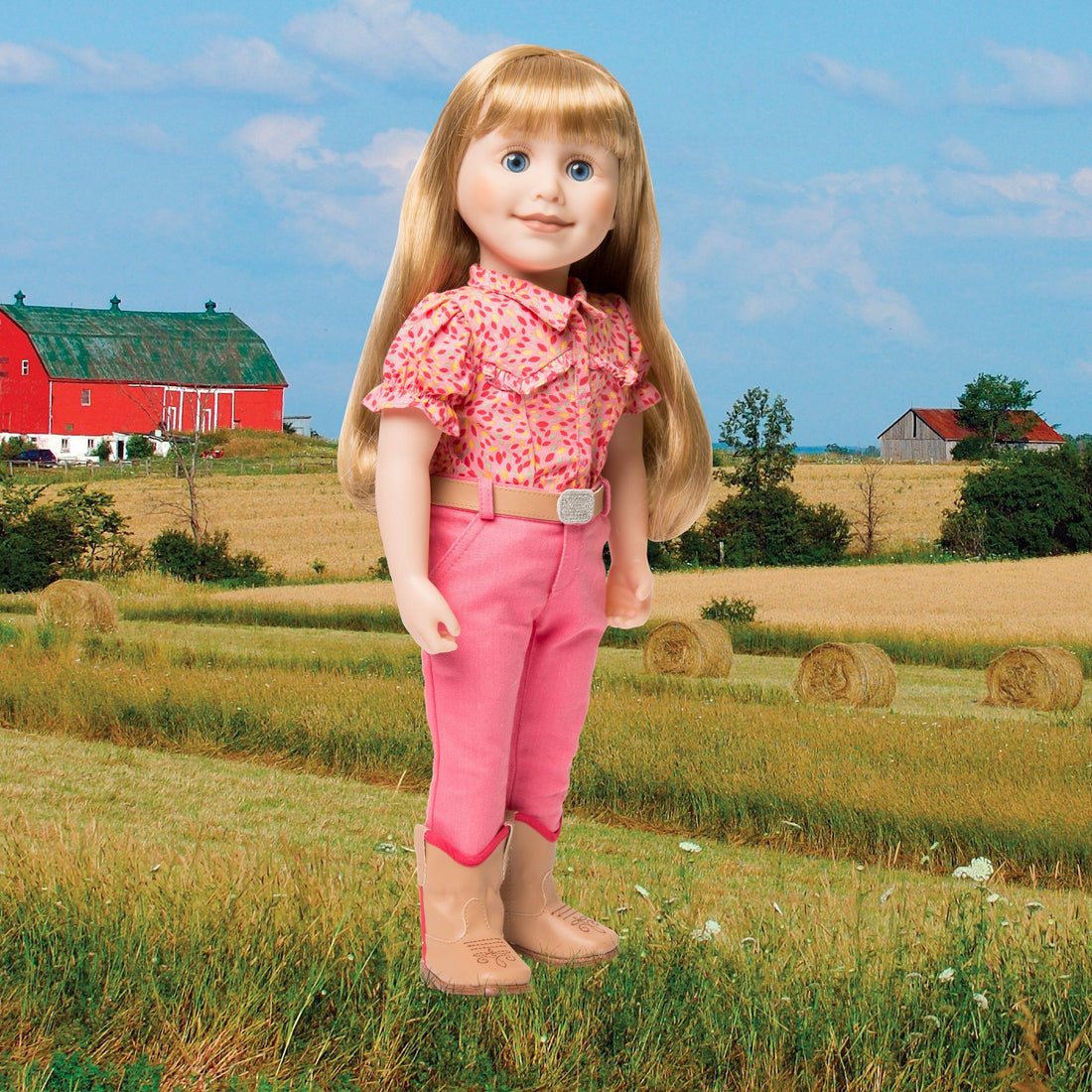 Brianne with story journal in pink patterned button-up shirt, pants, beige belt and beige boots.