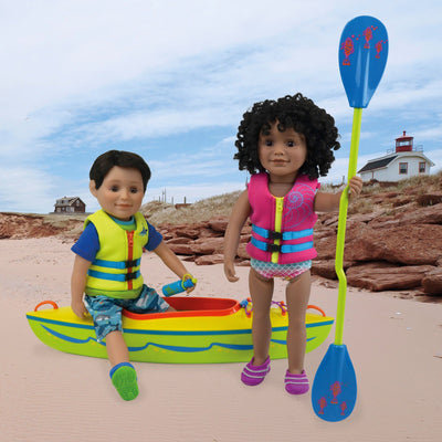 boy doll and girl doll wearing lifejackets and bathing suits