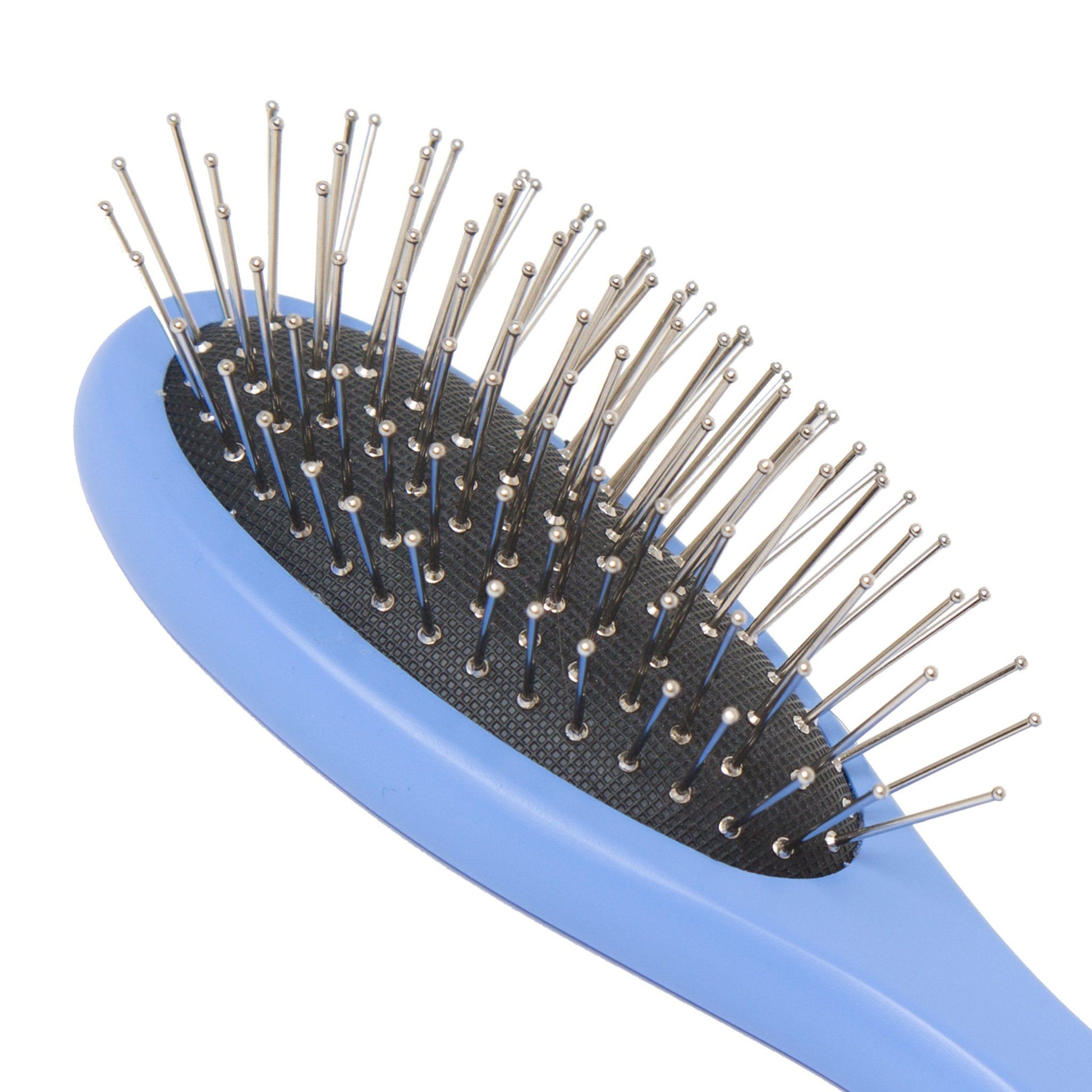 close up of maplelea metal-bristle hair brush for all 18-inch dolls.