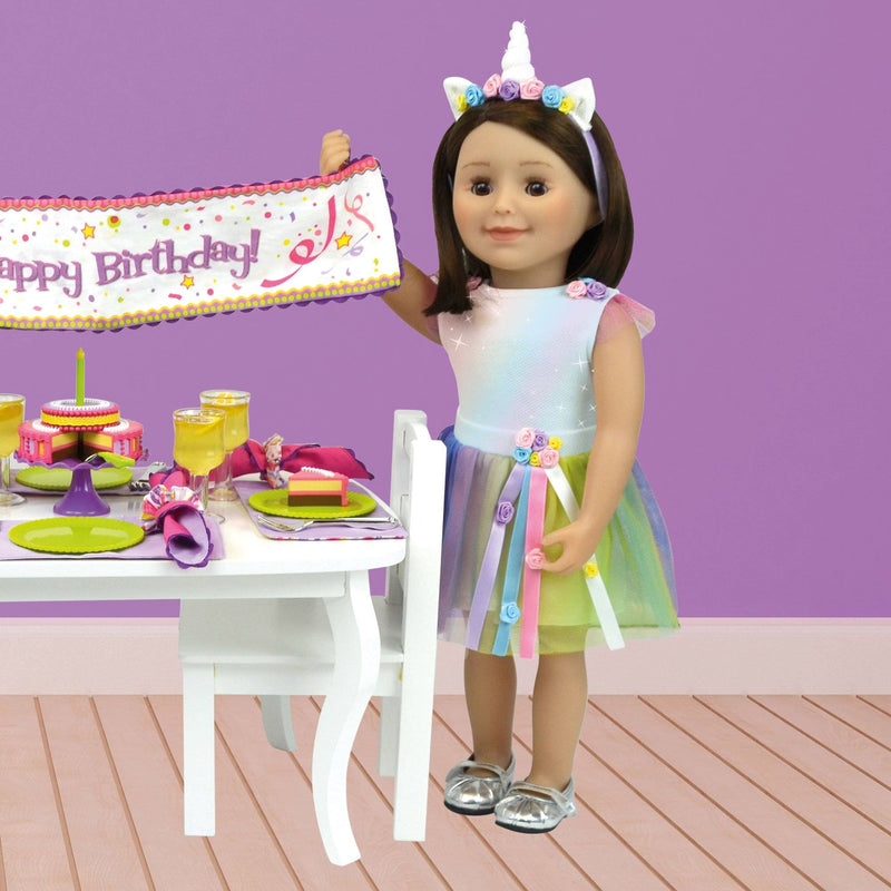 18-inch doll dressed in unicorn outfit with sparkly shoes