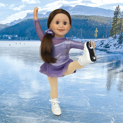 18 inch doll in figure skating dress and skates skating on a frozen lake