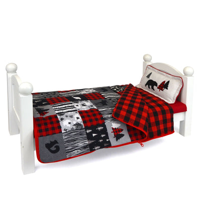 Patchwork quilt doll comforter set with grey, red and black buffalo plaid and animal silhouettes shown on doll bed