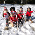 dolls dressed in hockey gear ready to play pond hockey