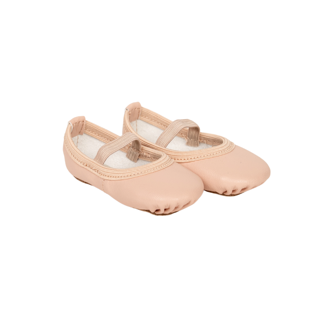 A pair of light peach-pink ballet flats with elastic straps, shown on a plain white background.