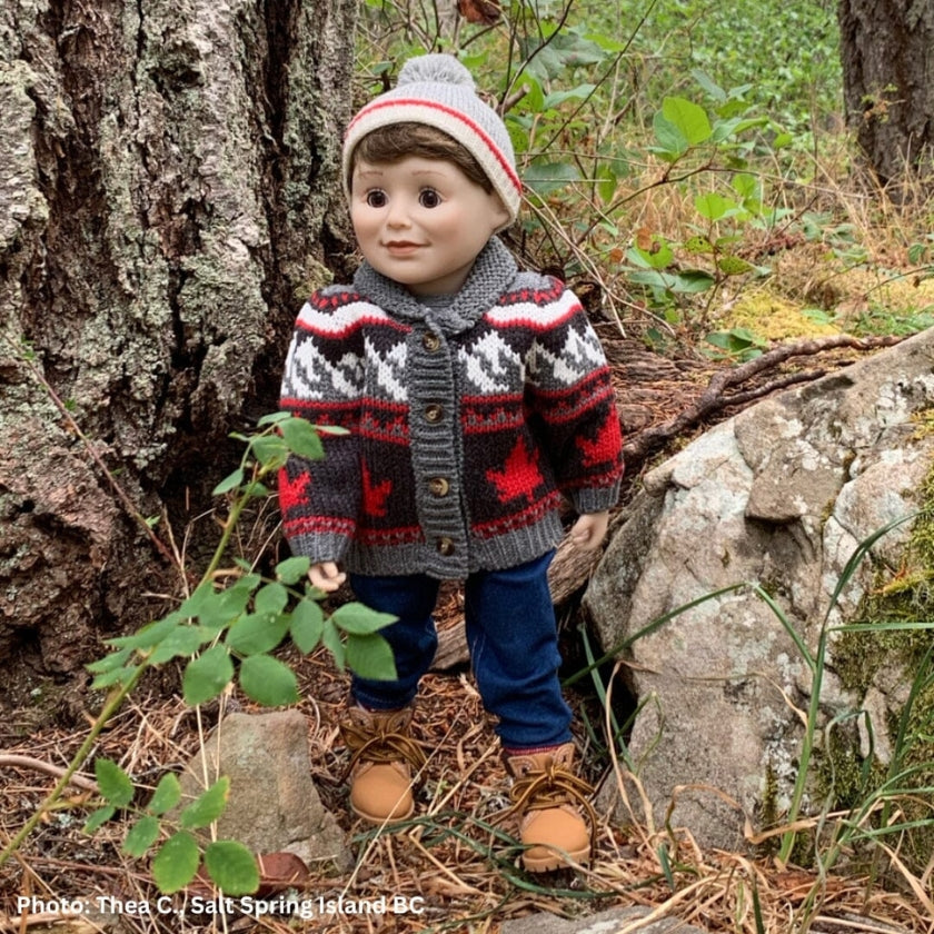a boy doll wearing outdoor clothing in Canada