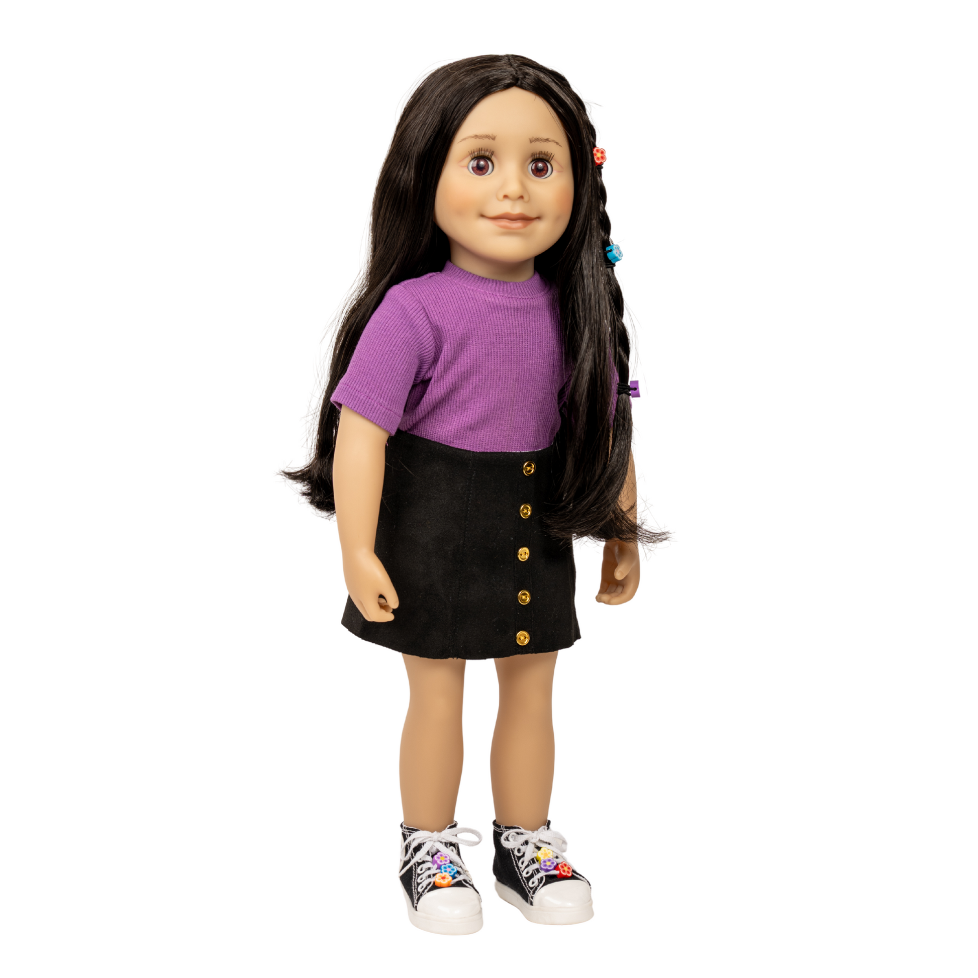 18-inch doll wearing a purple shirt and black skirt with colorful lace up shoes.