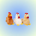 Three plush chicken toys in different colors for play with 18-inch dolls