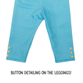close up of button detailing on blue leggings for 18-inch dolls.