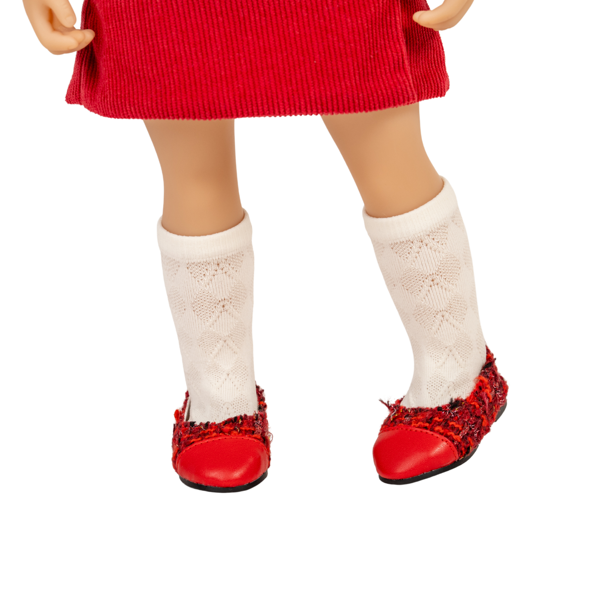 18-inch doll wearing cream coloured turtleneck top with red skirt, knee high socks and red shoes.