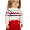 18-inch doll wearing a white sweater with cardinal motif and a red skirt with gold fleur-de-lys buttons. French-Canadian Girl doll, Leonie.