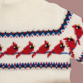 Knitted sweater for 18-inch dolls with red cardinal bird pattern by Maplelea Canadian Girl Dolls.
