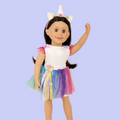 18-inch doll wearing colourful unicorn costume with unicorn horn headpiece.
