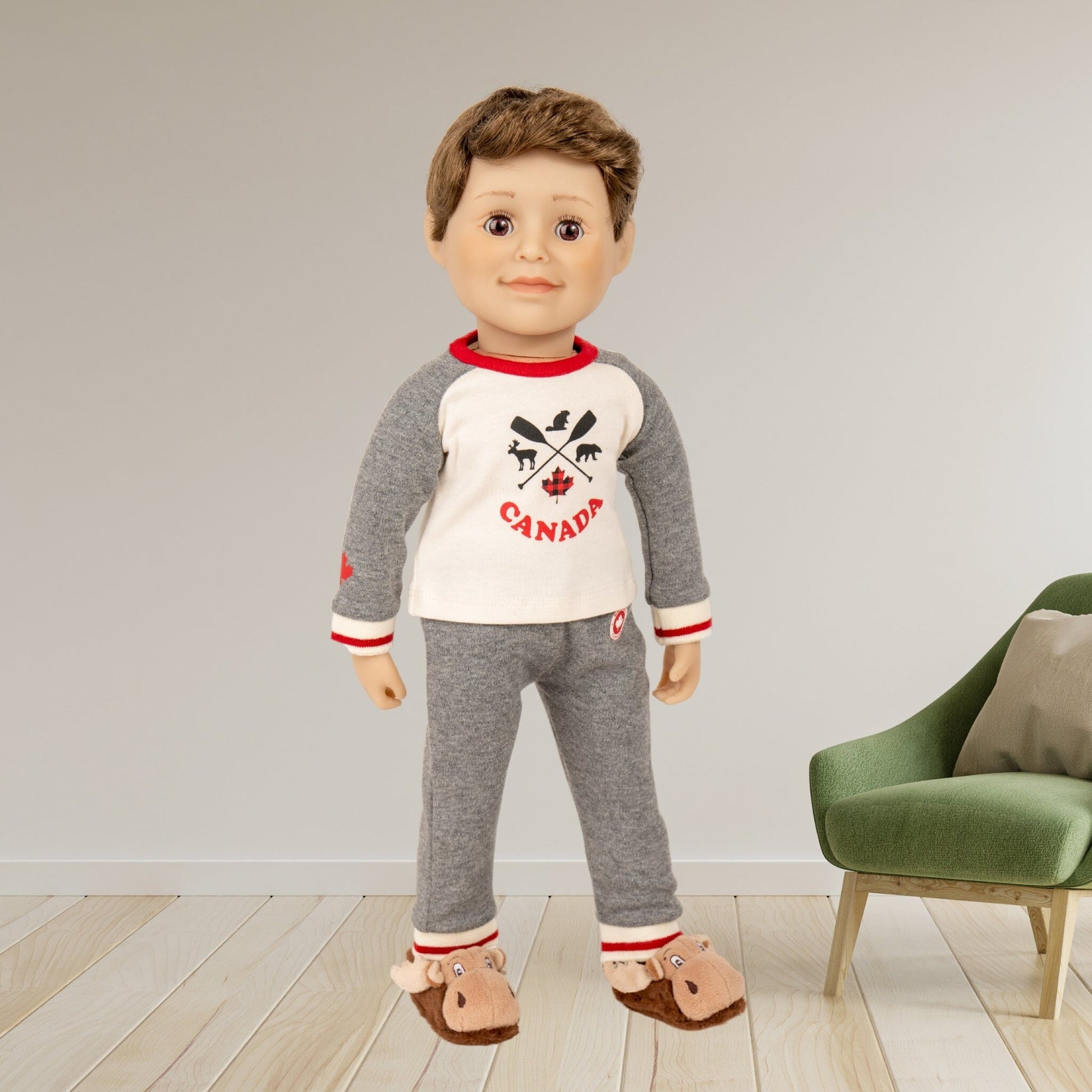 Maplelea 18" boy doll wearing moose slippers and iconic pjs