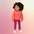 Dark skinned Maplelea doll with beautiful curly hair wearing camping outfit annd peach runners. 