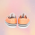 Cute shiny peach doll sneakers shiny with elastic laces. 